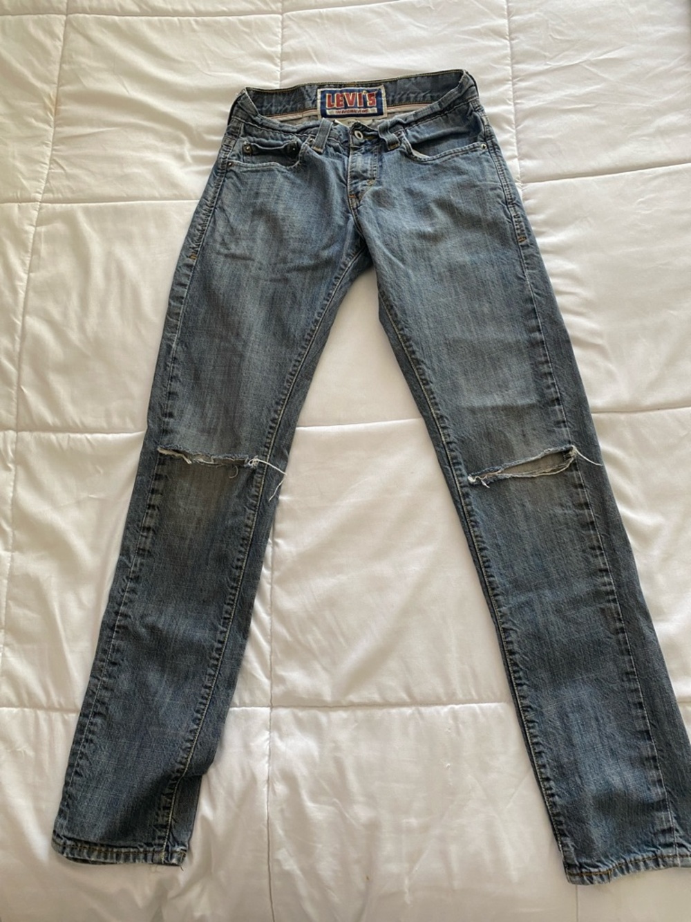 Levi's Skinny 511 Jeans in Faded Blue with Knee Rips